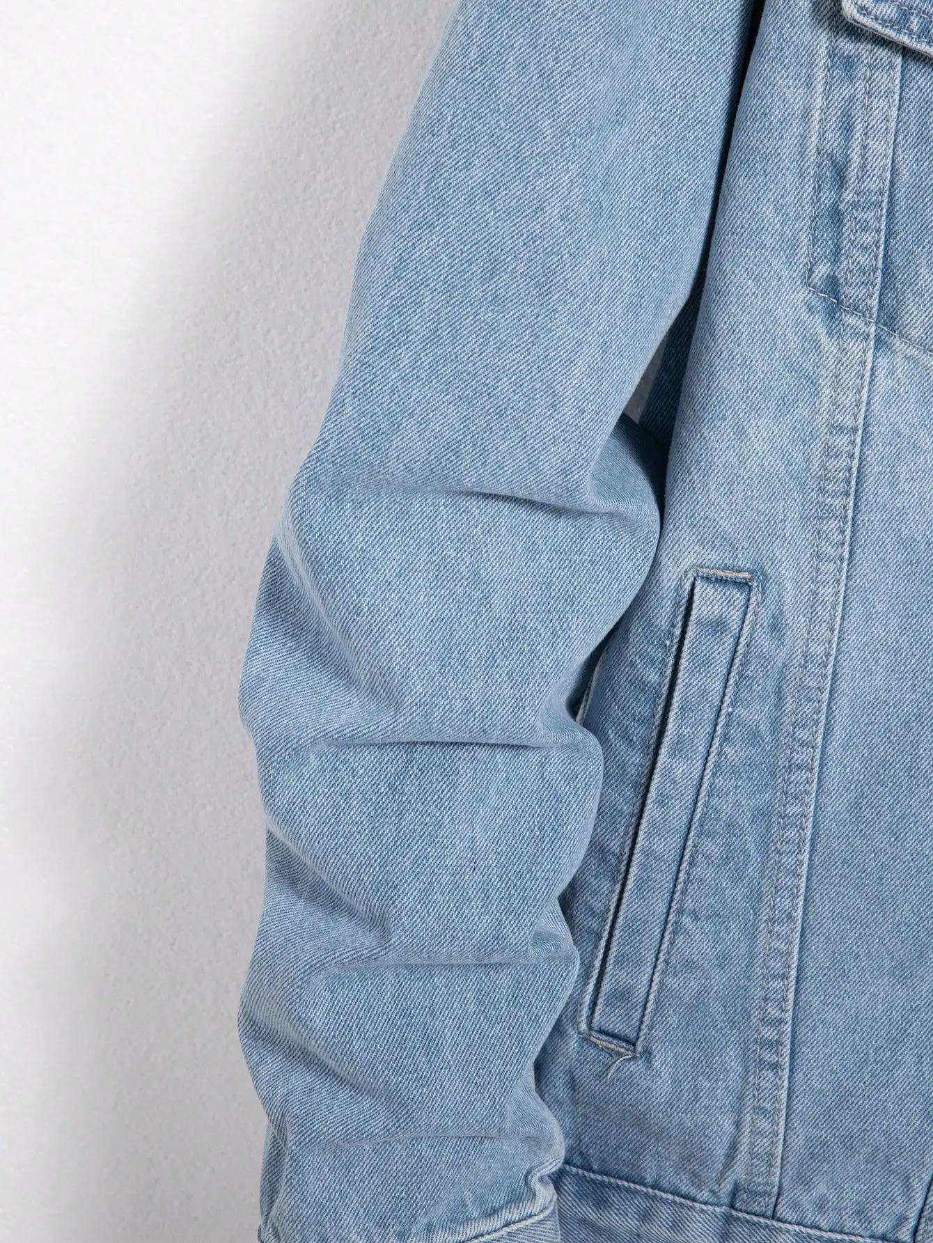 Men’s denim jacket for spring and autumn. Blue denim coat. Daily casual wear. Fashion trend.