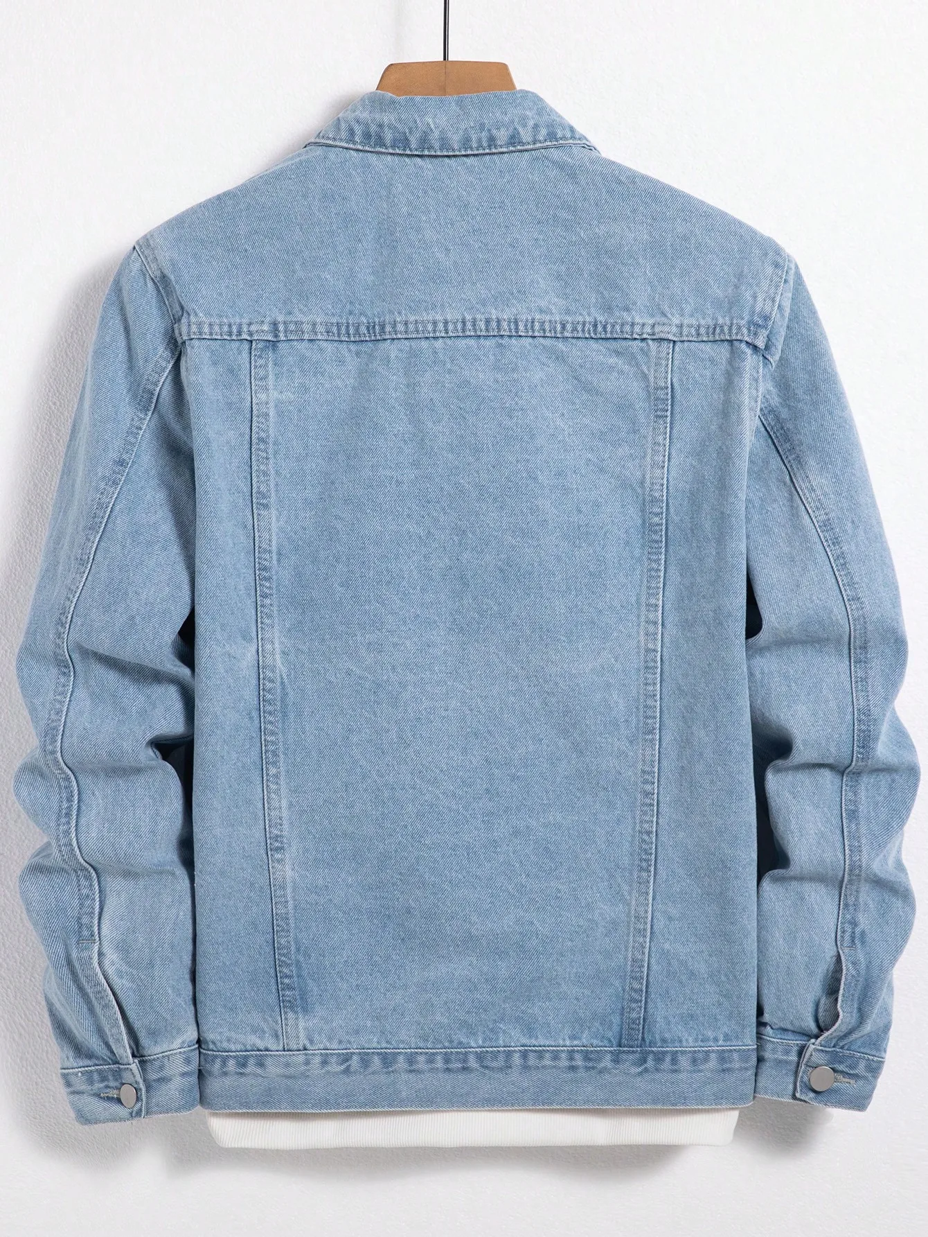 Men’s denim jacket for spring and autumn. Blue denim coat. Daily casual wear. Fashion trend.